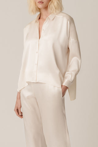 Front view of HERTH Tara shirt in Almond organic silk — timeless sustainable shirt crafted in Italy, available at ASSOLUTO boutique.